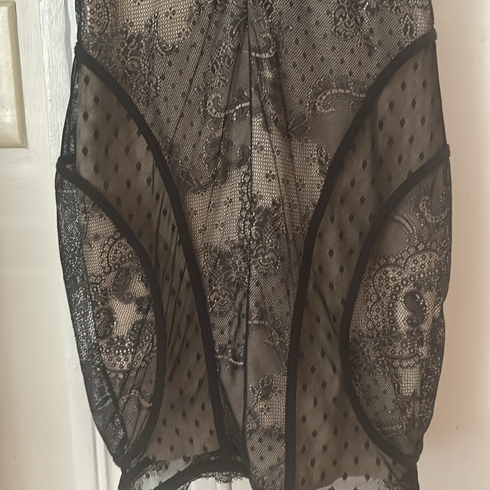 Bebe size small Lacey black tight dress. Zipper works. Never been worn! - Picture 3 of 5
